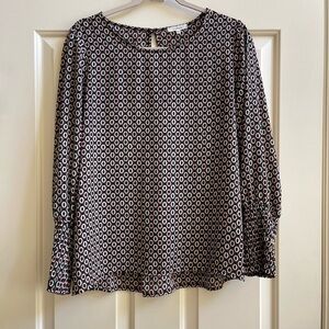 Pleione dot print blouse with smocked sleeves